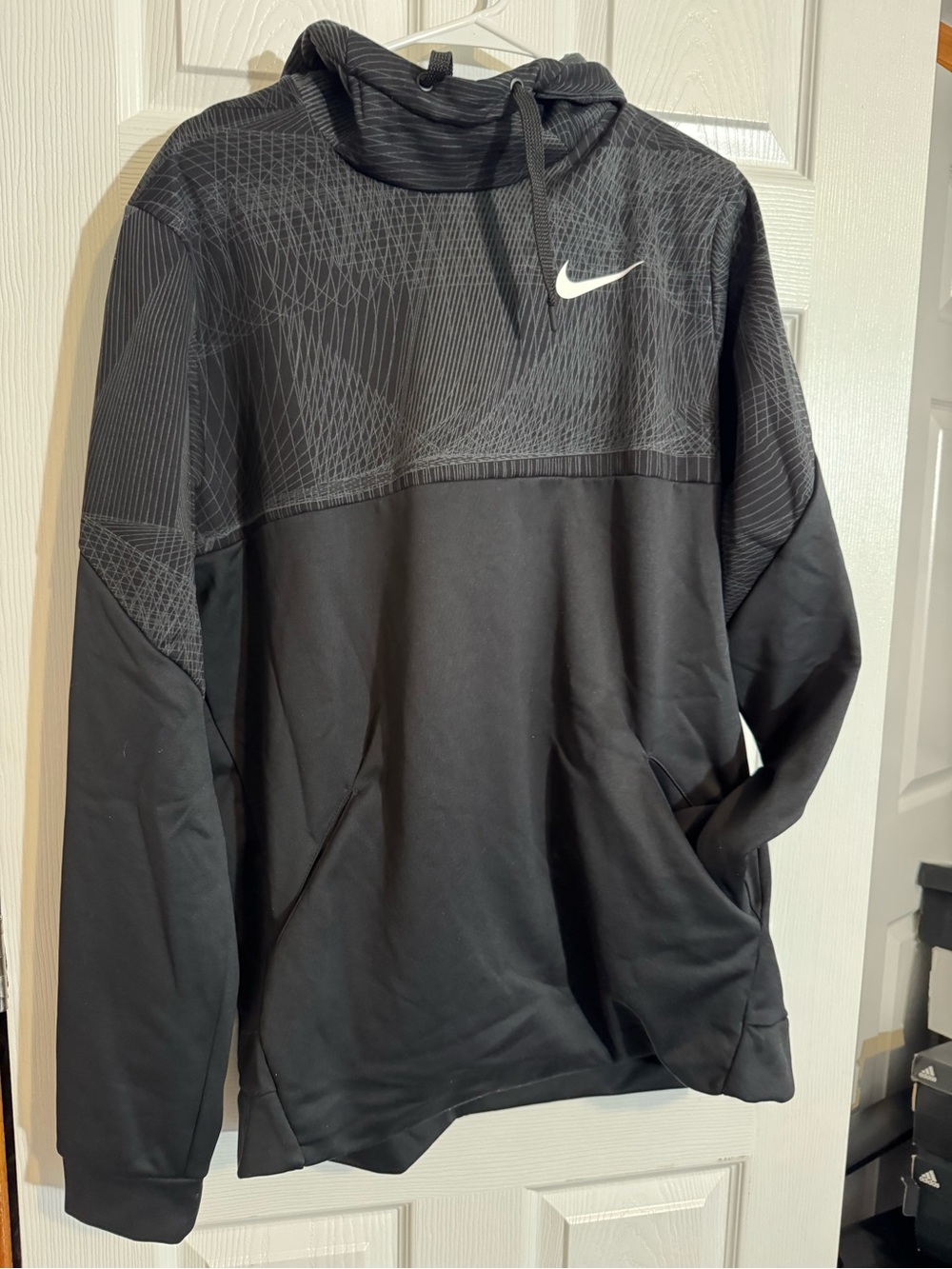 Nike Black Hoodie with White Swoosh and Geometric Chest Pattern